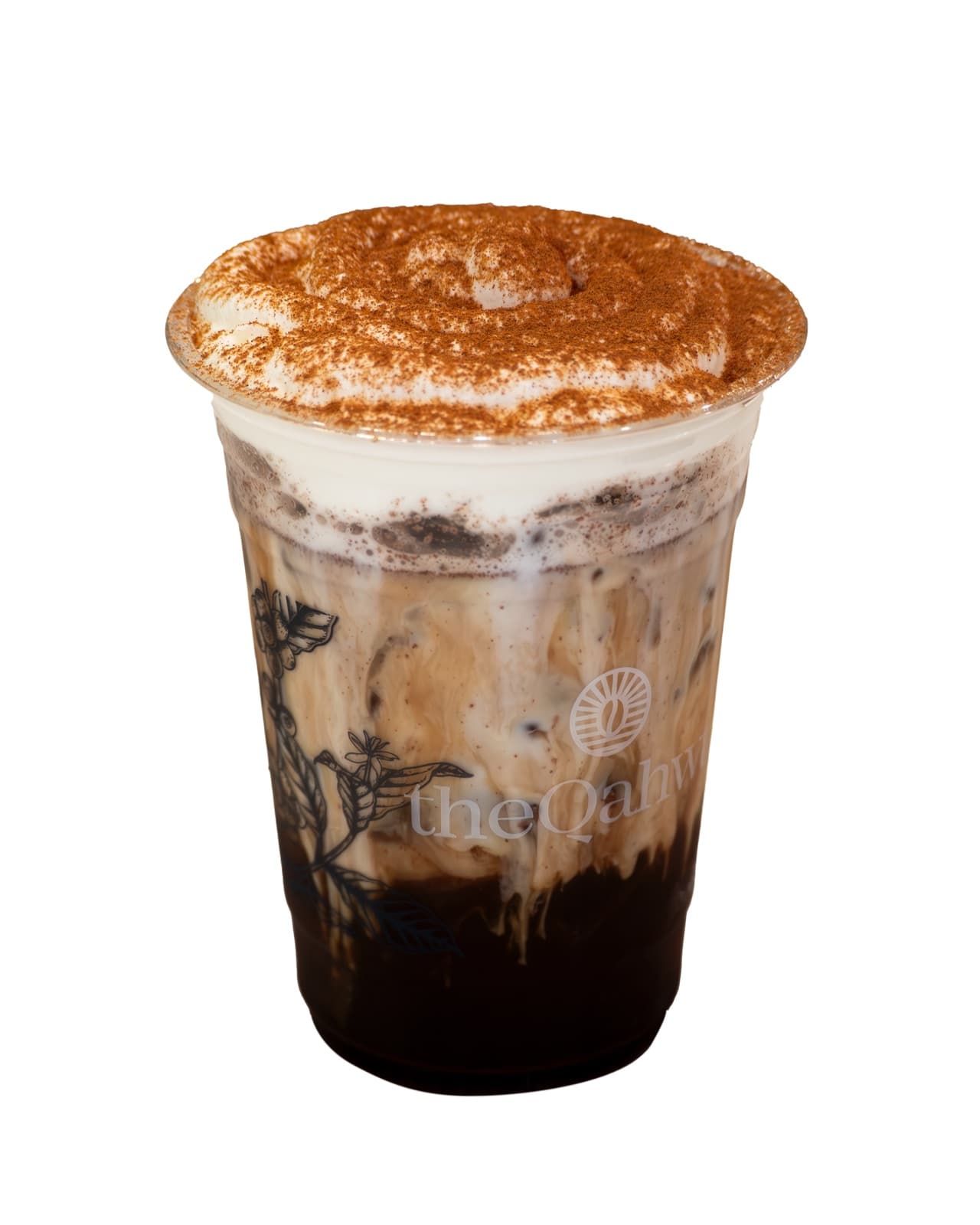 Brown Sugar Latte in a clear theQahwa cup — dark espresso and brown sugar over ice, topped with a thick cinnamon-dusted cream foam.